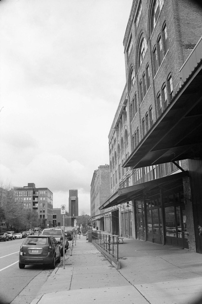 A black and white photo of a street in the North Loop of Minneapolis.